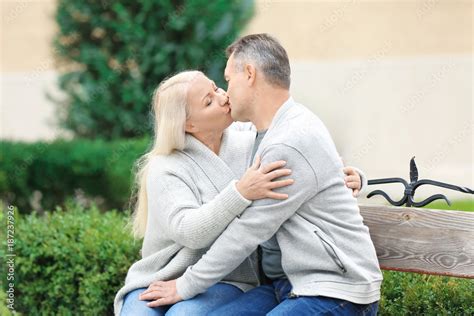 mature kissing